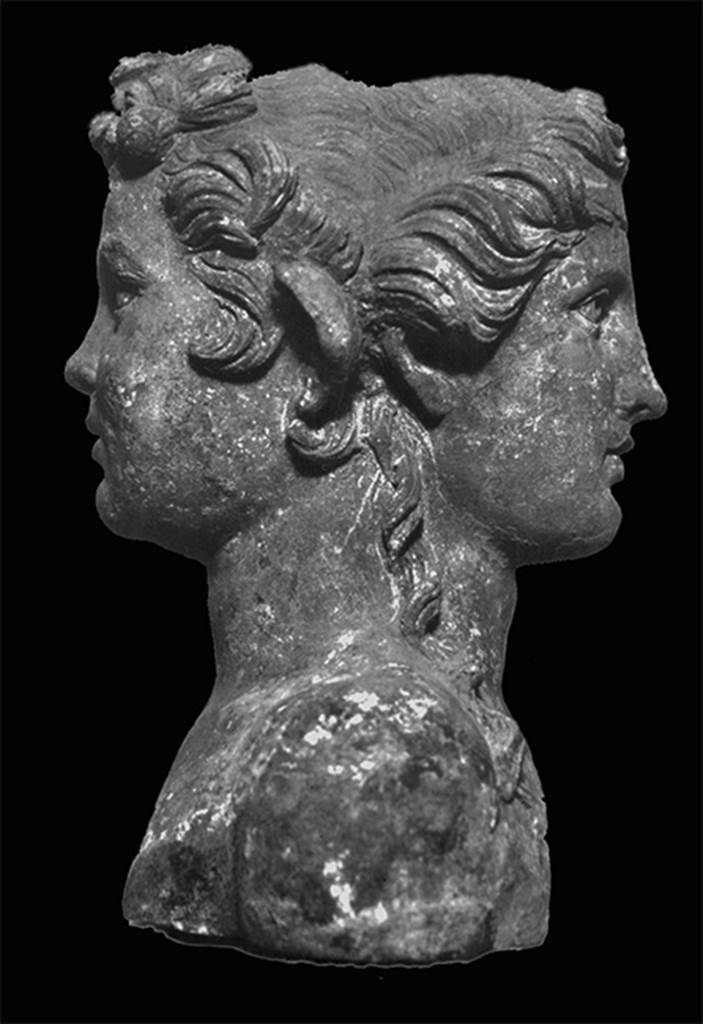 VII.4.60/61 Pompeii. Bronze double herm. One of eight found here.
On one side a young Dionysus with shoulder length curls and hair tie.
On the other side a satyr.  
Now in Naples Archaeological Museum. Inventory number 5074.
See Staub-Gierow M., 2000. Casa della Parete Nera: Hauser in Pompeji 10. Munchen: Hirmer, p. 21, taf. 271-274.
