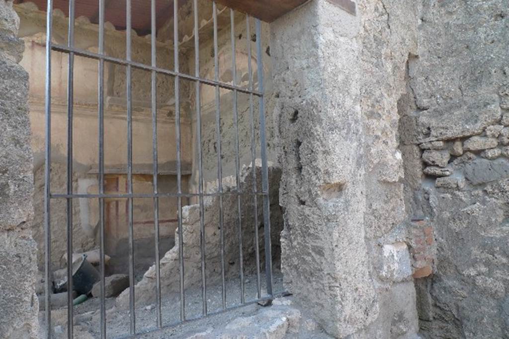 VII.4.62 from VII.4.63 Pompeii. July 2010. Window in south wall of VII.4.63, looking into VII.4.62. Photo courtesy of Michael Binns.