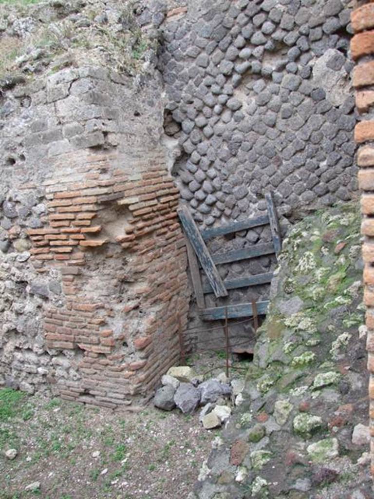 VII.5.7 Pompeii. December 2007. Remains of staircase on west side of entrance (26) to Forum Baths boiler area.