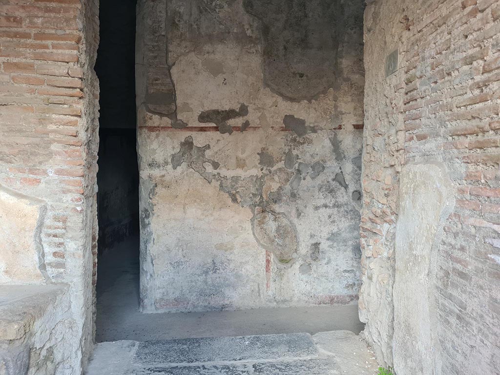 VII.5.8 Pompeii. October 2024.
Looking south from entrance doorway to corridor (45), centre left. Photo courtesy of Klaus Heese.