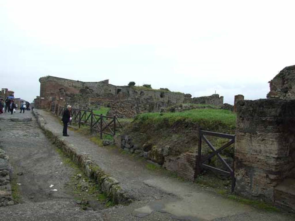 VII.6.3 Pompeii. May 2010. Looking east, past VII.6.1 and VII.6.2 to the entrance to VII.6.3 in the centre. North side of insula on Via delle Terme.