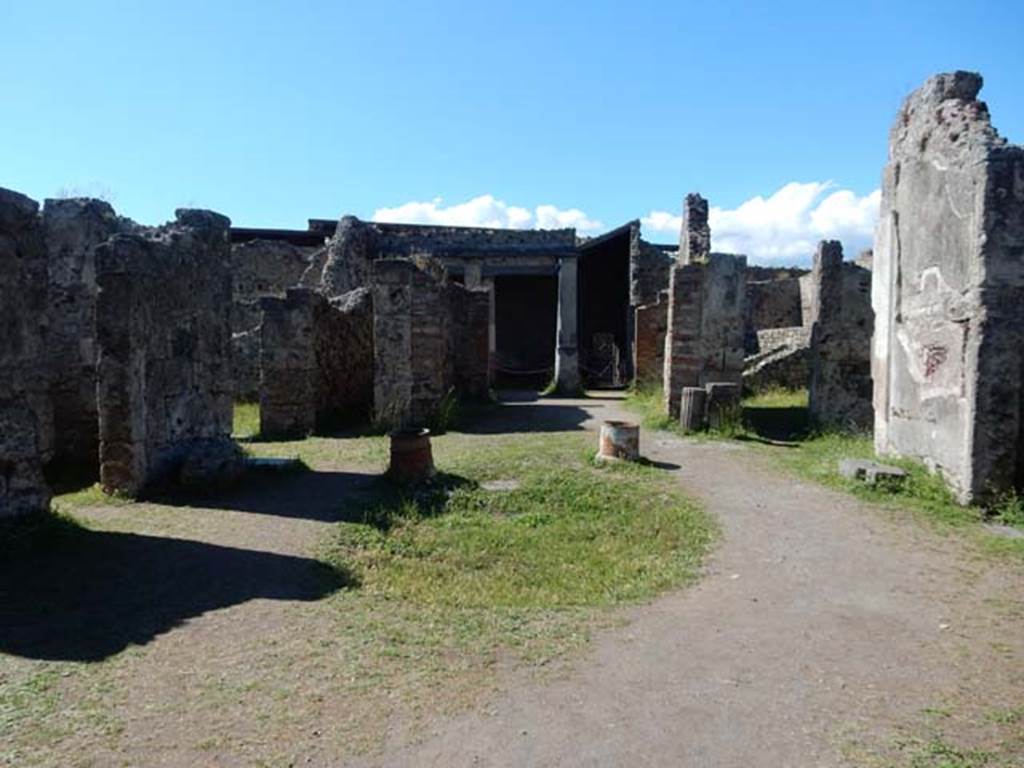 VII.7.10 Pompeii. May 2018.
Looking north across atrium towards the recess for the impluvium, having been found without any slabs of decoration.
A short distance away the terracotta puteal for the cistern mouth was found. Photo courtesy of Buzz Ferebee.