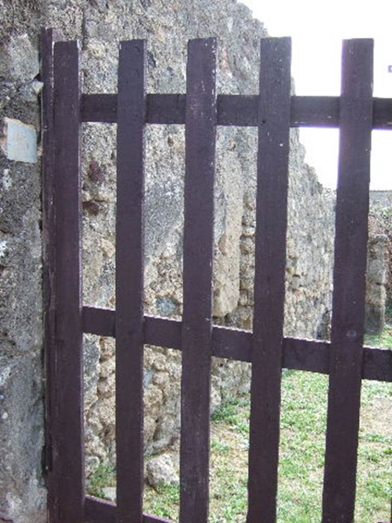 VII.7.15 Pompeii. September 2005. Looking south through rear entrance doorway.