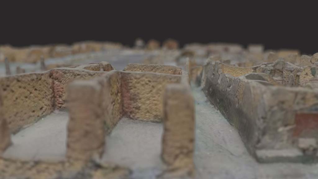 VII.7.23 Pompeii. October 2017. Detail from model in Naples Archaeological Museum.
According to the detail above, the entrance “alley or small vicolo” (on right) would have been decorated with Zebra Stripes. 
Information and Foto from Taylor Lauritsen, ERC Grant 681269 DÉCOR.
