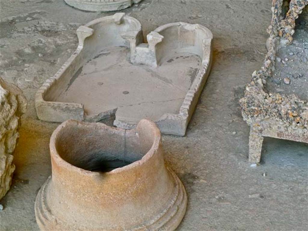 VII.7.29 Pompeii. May 2011. Terracotta portable stove with two "hotplates" in storage. Photo courtesy of Michael Binns.