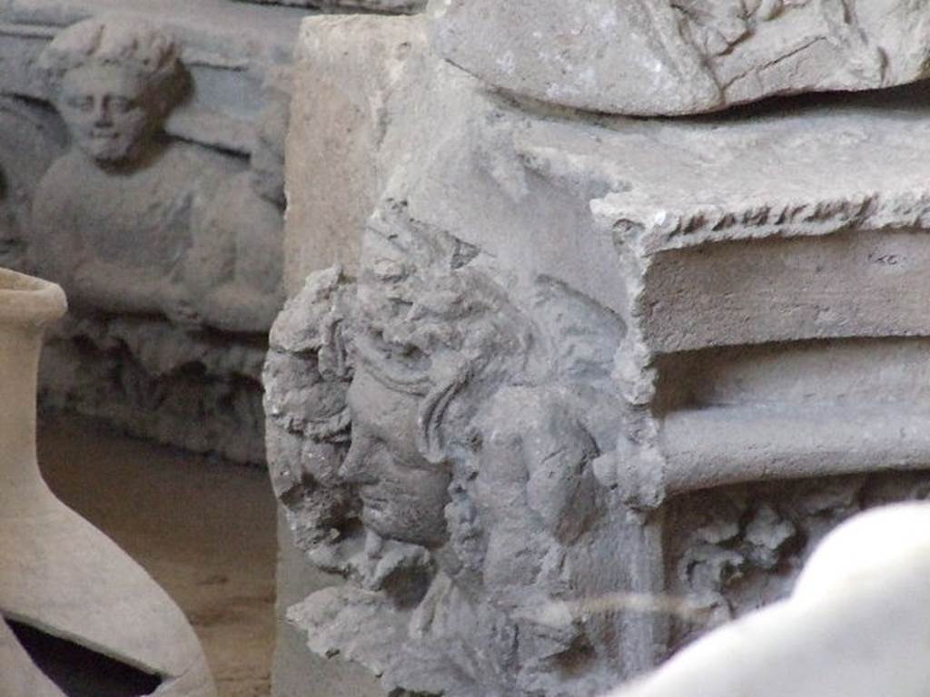 VII.7.29 Pompeii. December 2006.  Items in storage.  Capital from house doorway at V.1.7.