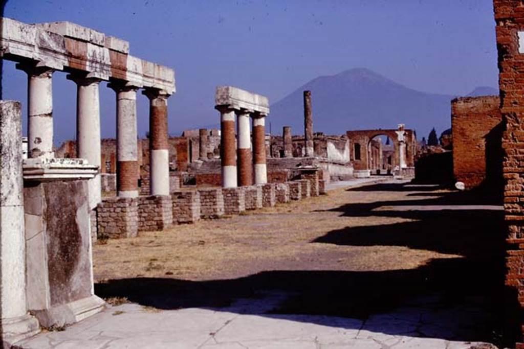 VII.8 Pompeii Forum. 1974. Looking north-west across the east side, from Eumachia’s portico. Photo by Stanley A. Jashemski.
Source: The Wilhelmina and Stanley A. Jashemski archive in the University of Maryland Library, Special Collections (See collection page) and made available under the Creative Commons Attribution-Non Commercial License v.4. See Licence and use details. J74f0703