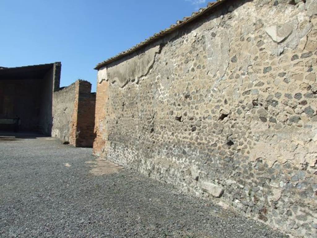 VII.9.7 and VII.9.8 Pompeii. Macellum. March 2009. North wall.  Looking west.