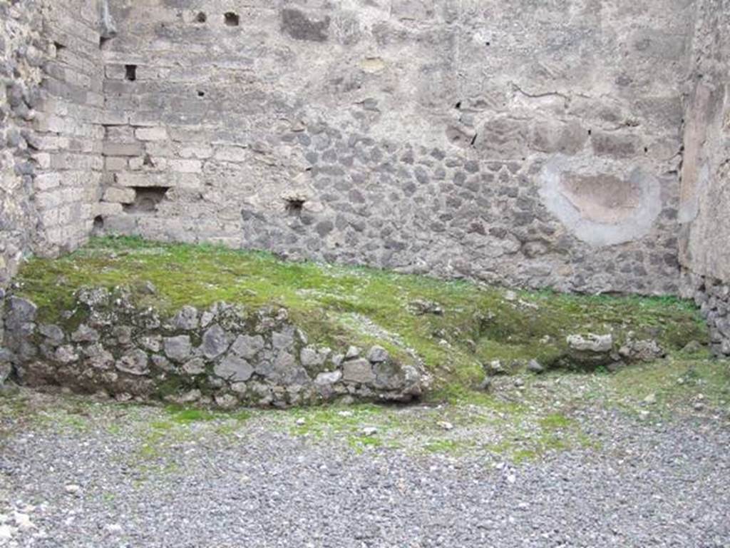 VII.9.18 Pompeii. December 2007. Remains of two sided hearth, with a nearby latrine.
