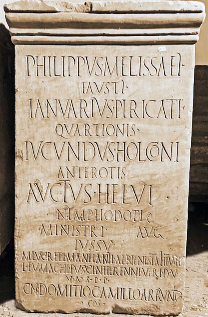 VII.9.47 Pompeii. Marble pedestal with inscription discovered 5th September 1820.
Now in Naples Archaeological Museum. Inventory number 3787.
According to Franklin, this names the ministri Augusti for the year 31-32 AD.
See Franklin J. L., 2001. Pompeis Difficile Est. Ann Arbor: Univ. Michigan Press, p. 52.
According to Epigraphic Database Roma this reads

Philippus Melissaeì
Faustì 〈:servus〉,
Ianuarius Piricati
Quartionis 〈:servus〉,
Iucundus Holconi 
Anterotis 〈:servus〉,
Auctus Helvi
Nymphodoti 〈:servus〉.
ministri Aug(usti),
iussu 
M(arci) Lucreti Manlianì, L(uci) Albieni Staì I̅I̅v(irorum) i(ure) d(icundo),
L(uci) Eumachi Fusci, N(umeri) Herenni Veri d(uum)v(irorum)
v(iis) a(edibus) s(acris) p(ublicis) p(rocurandis),
Cn(aeo) Domitio, Camillo Arrun̂t̂io
co(n)s(ulibus).       [CIL X 899]

Franklin provides this translation:
[Philippus (slave) of Melissaeus Faustus, Ianuarius (slave) of Piricatius Quartio, Iucundus (slave) of Holconius Anteros, and Auctus (slave) of Helvius Nymphodotus (are named) attendants of Augustus by order of Marcus Lucretius Manlìanus and Lucius Albienus Staius, duovirs iure dicundo, and of Lucius Eumachius Fuscus and Numerius Herennius Verus, duovirs viis aedibus sacris publicisque procurandis, Gnaeus Domitius and Camillus Arruntius (being) consuls (at Rome).]
See Franklin J. L., 2001. Pompeis Difficile Est. Ann Arbor: Univ. Michigan Press, p. 53.

