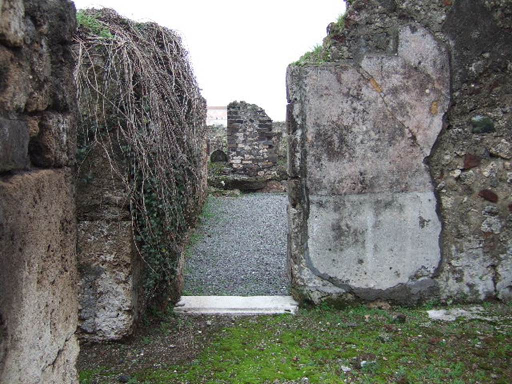 VII.9.47 Pompeii. December 2005. Room 14. Doorway to Kitchen area.