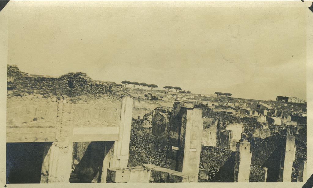 VII.9.68/67 Pompeii, on lower left. 29th March 1922.
Looking north-east across VII.9.68 and 67 on left, and VII.13, on right. Photo courtesy of Rick Bauer.