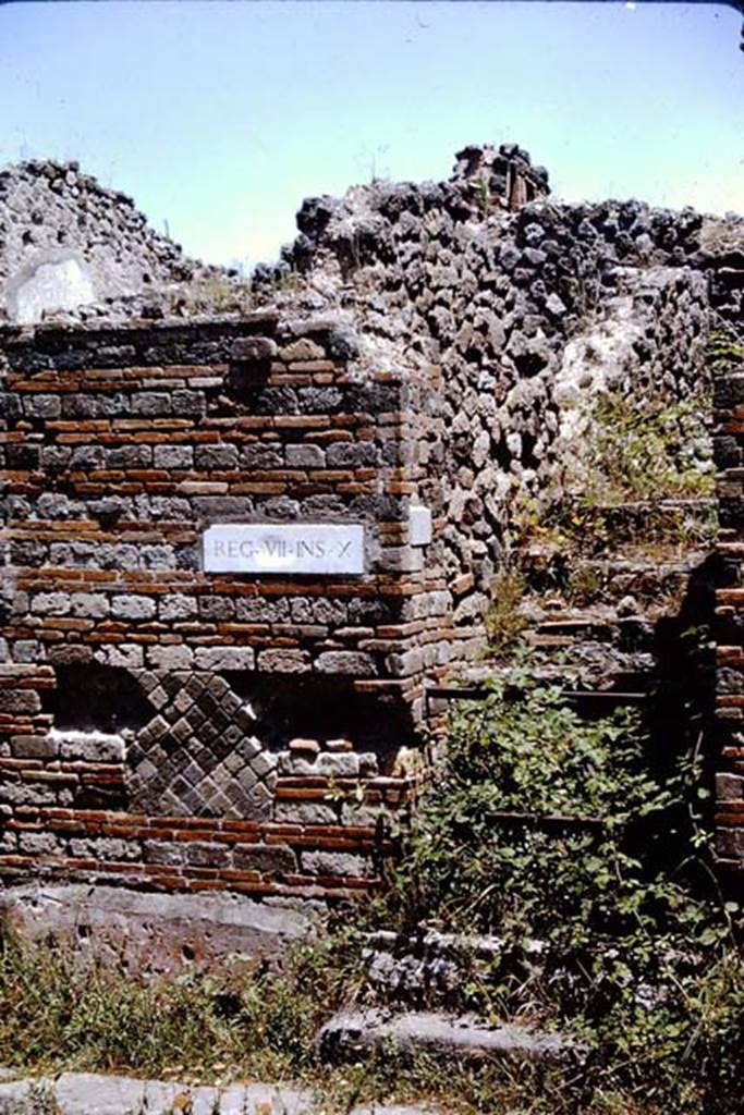 VII.10.1 Pompeii. 1964. Entrance to stairs to upper floor.  Photo by Stanley A. Jashemski.
Source: The Wilhelmina and Stanley A. Jashemski archive in the University of Maryland Library, Special Collections (See collection page) and made available under the Creative Commons Attribution-Non Commercial License v.4. See Licence and use details.
J64f1546
