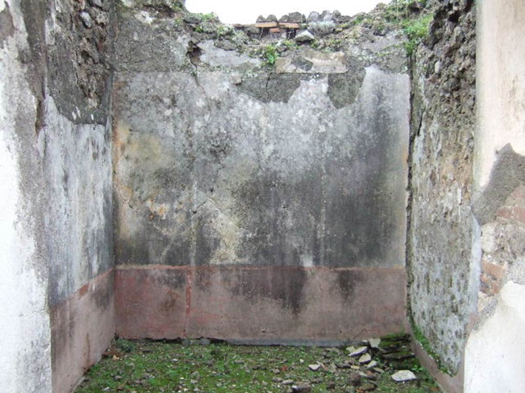 VII.10.3 Pompeii. December 2005. Room 10, looking south. According to Amoroso, the top of the walls were painted with plaster in two horizontal bands. The middle section of each wall was separated into three vertical panels edged with a border. The central area was white, and the two sides panels were yellow. The zoccolo was red with plant motifs painted on it. Found painted on the walls of this room were vignettes showing sirens hovering in the air on monochrome green and yellow background. They held the plate and crook.
Studi della Soprintendenza archeologica di Pompei, 22: l”Insula VII, 10 di Pompei , by Angelo Amoroso. (p.74) 
See Helbig, W., 1868. Wandgemälde der vom Vesuv verschütteten Städte Campaniens. Leipzig: Breitkopf und Härtel. (899)
