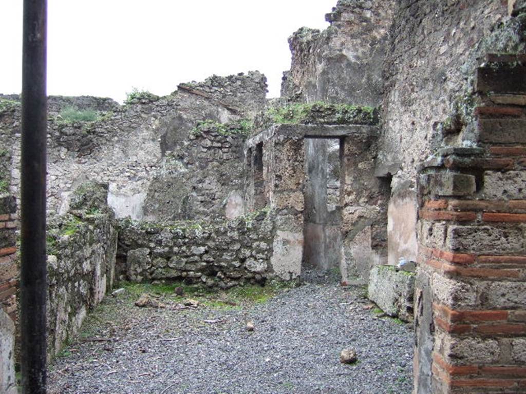 VII.10.9   Rear entrance to small house and shop.  
Linked to VII.10.12