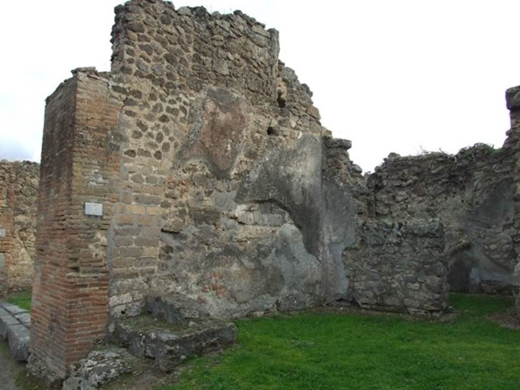 VII.12.4 Pompeii. December 2007. East wall of shop, with base of staircase.
According to Della Corte, an electoral recommendation was found written on the wall to the left of entrance number 4. It read 
Capella fac  [CIL IV 619].  See VII.12.3.
See Della Corte, M., 1965.  Case ed Abitanti di Pompei. Napoli: Fausto Fiorentino. (p.183)
