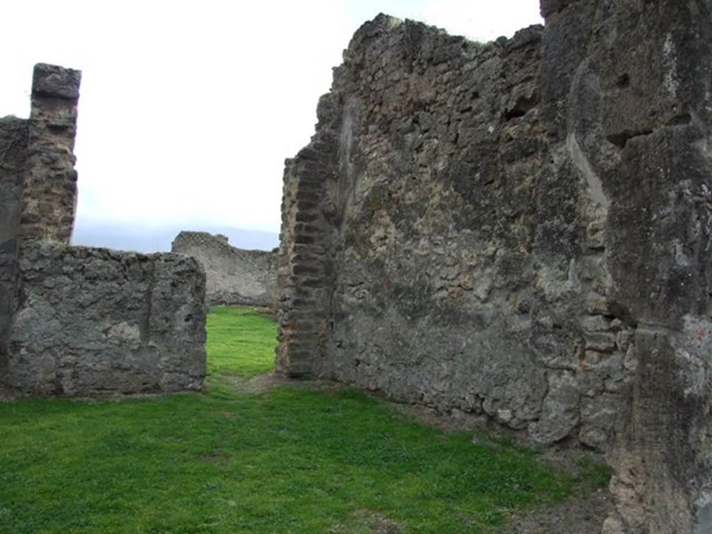 VII.12.4 Pompeii.  December 2007.  West wall and doorway in south wall to atrium of VII.12.3.