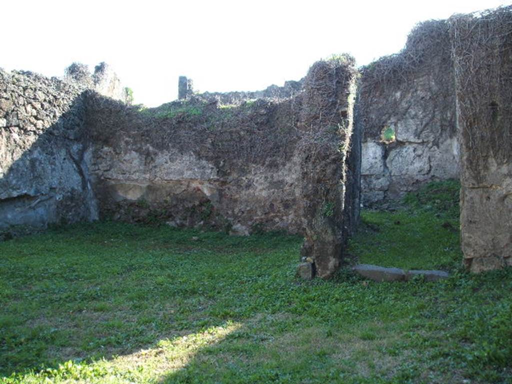 VII.12.12 Pompeii. September 2005. South side of shop-room.