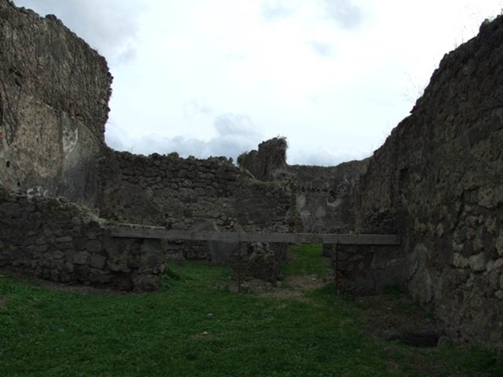 VII.12.13 Pompeii. December 2007. Looking south to rear room on left, and corridor to bakery area on right.