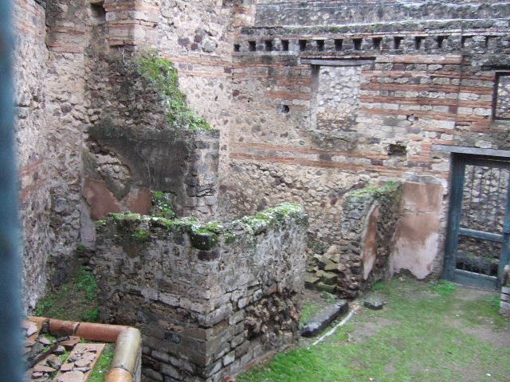 VII.12.17 Pompeii. December 2005. Looking east towards room on north side, taken from VII.12.21.


