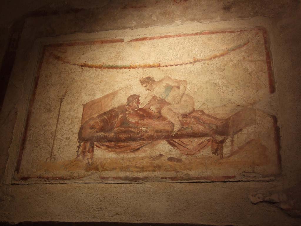 VII.12.18 Pompeii. December 2006. Erotic wall painting on frieze.