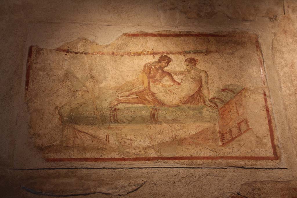VII.12.18 Pompeii. April 2014. Painted erotic wall fresco on frieze. Photo courtesy of Klaus Heese.