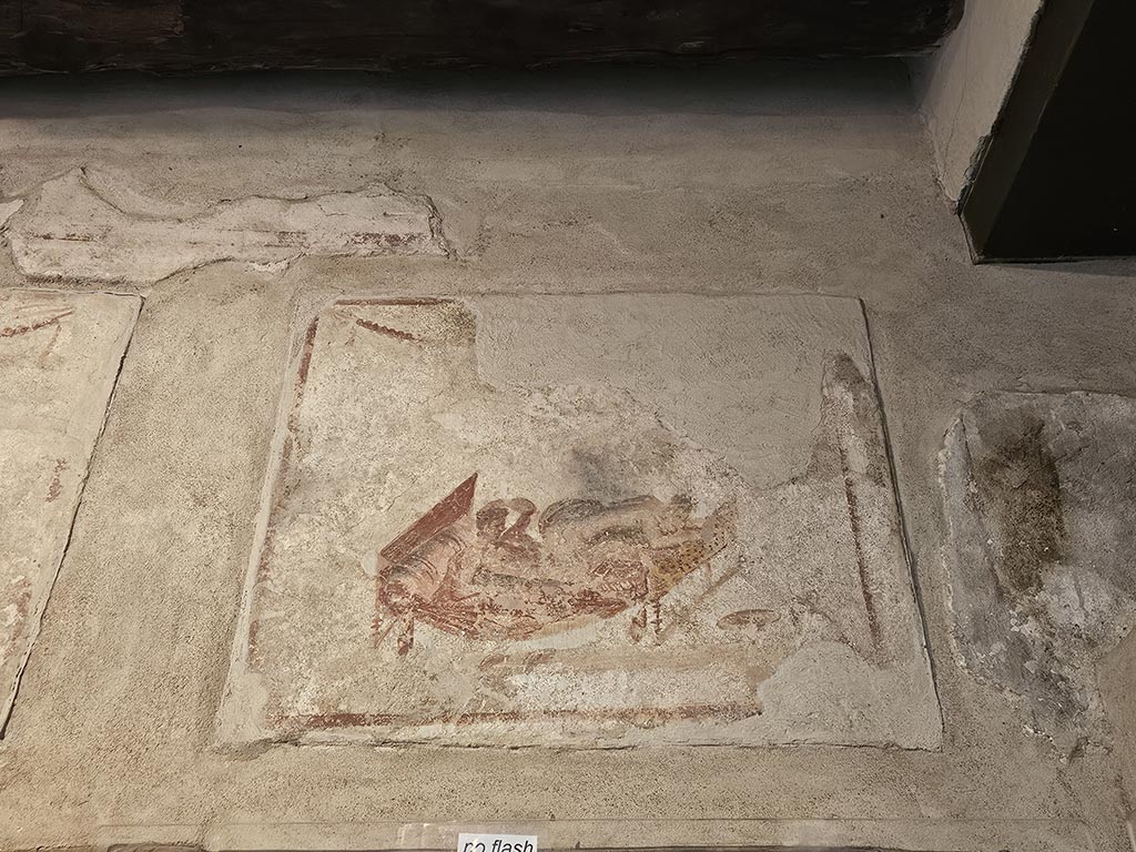 VII.12.18 Pompeii. November 2024. Painted erotic wall fresco on frieze. Photo courtesy of Annette Haug.