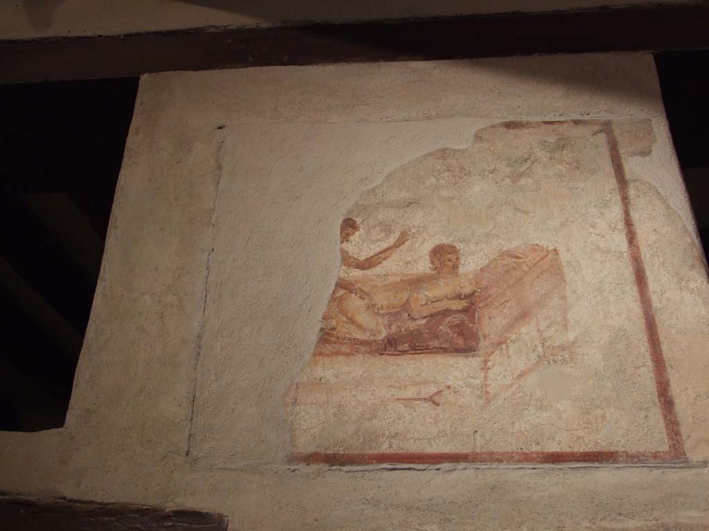 VII.12.18 Pompeii. December 2006. Remains of erotic wall painting on frieze.