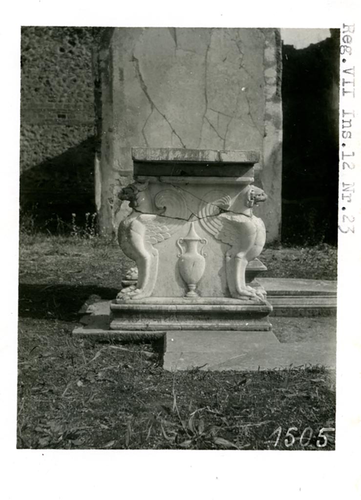 VII.12.21 Pompeii. Pre 1937-39. Marble table supported by Griffins.
Photo courtesy of American Academy in Rome, Photographic Archive. Warsher collection no. 1505.
Warscher in 1948 notes: “La mensa e trasportata nel Museo di Pompei”. 
See Warscher T, 1948. Marmi di Pompeii: Vol. 3. Rome: Swedish Institute, fig. 133b.

