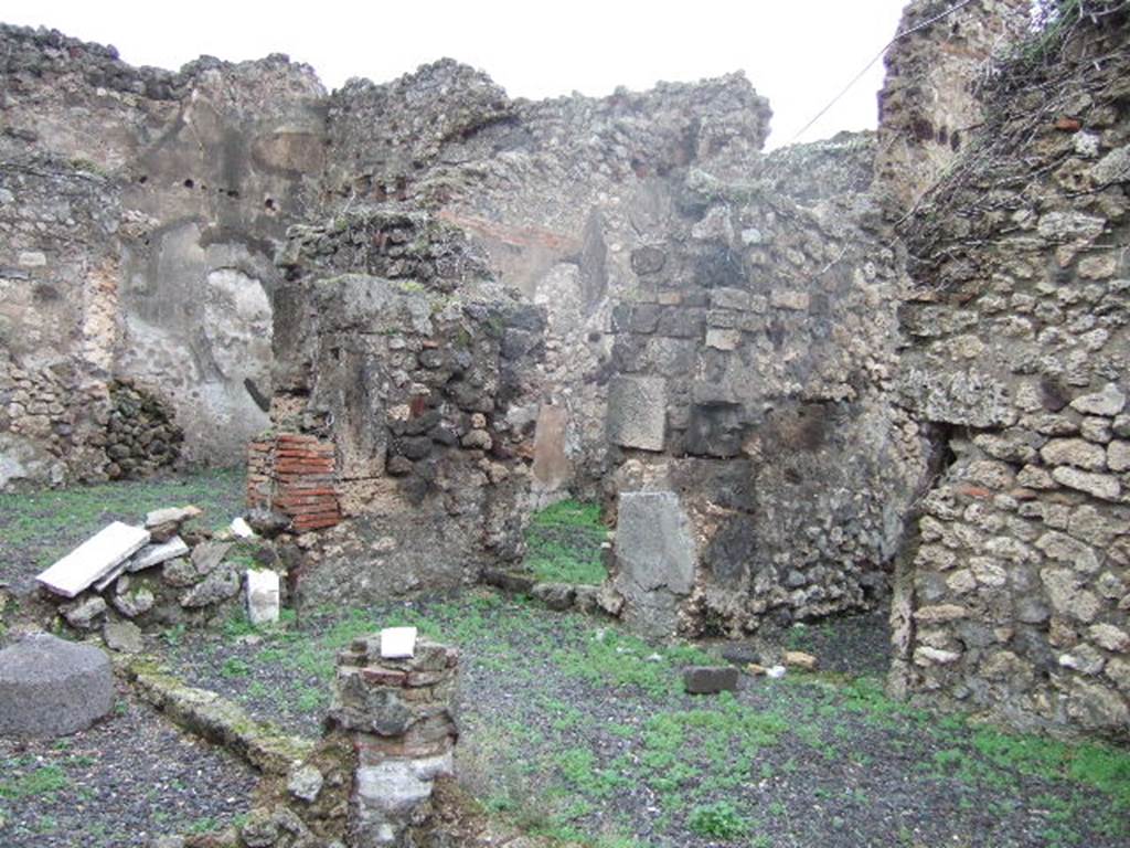 VII.12.26 Pompeii. December 2005.  Looking north east across Portico area.