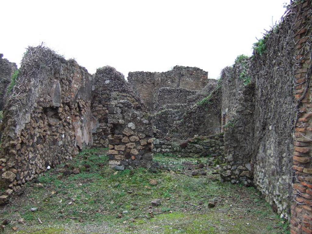 VII.12.34 Pompeii. December 2005. Looking east across bar-room. On the right at the rear was the doorway to the triclinium, on the rear left was a corridor leading to the latrine. On the extreme left, is a doorway linking to VII.12.35. According to Hobson, the siting of latrines is most often off a narrow corridor. In both VII.12.34 and 35, there would have been a great deal of privacy.
See Hobson, B., 2009. Latrinae et foricae: Toilets in the Roman World. London; Duckworth, (p.168)
