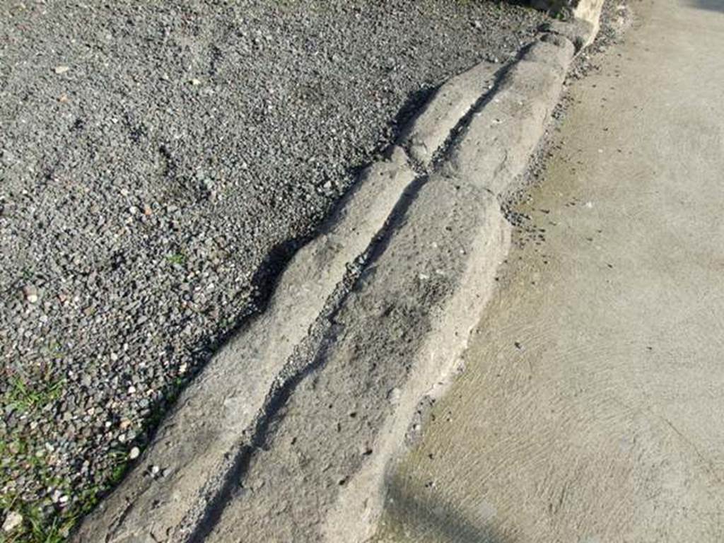 VII.14.1 Pompeii. December 2007. Entrance threshold or sill with groove for sliding doors.
