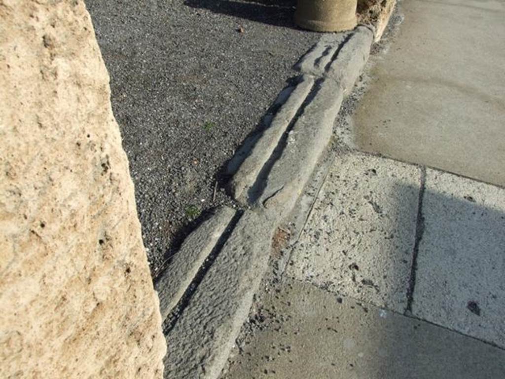 VII.14.2 Pompeii. December 2007. Entrance threshold or sill with groove for sliding doors.