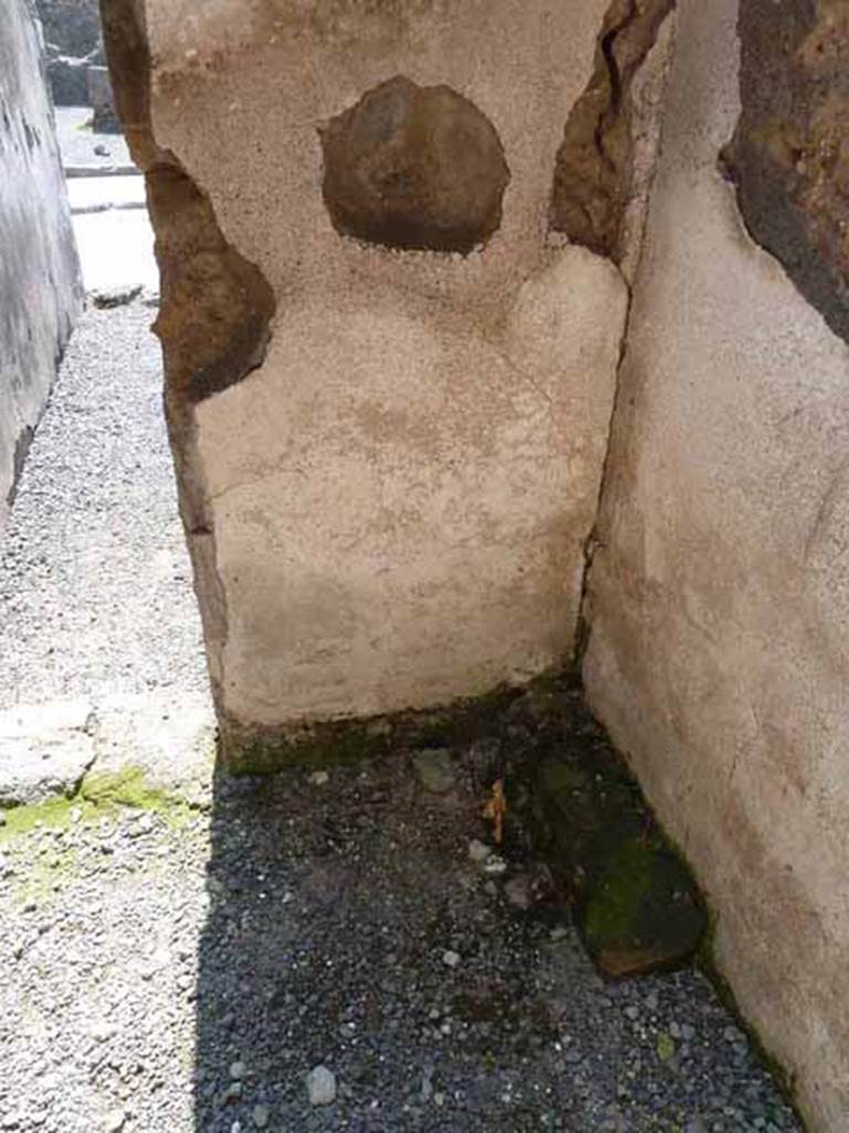 VII.14.4 Pompeii. May 2010. South wall of rear room, with doorway on south-east side.
