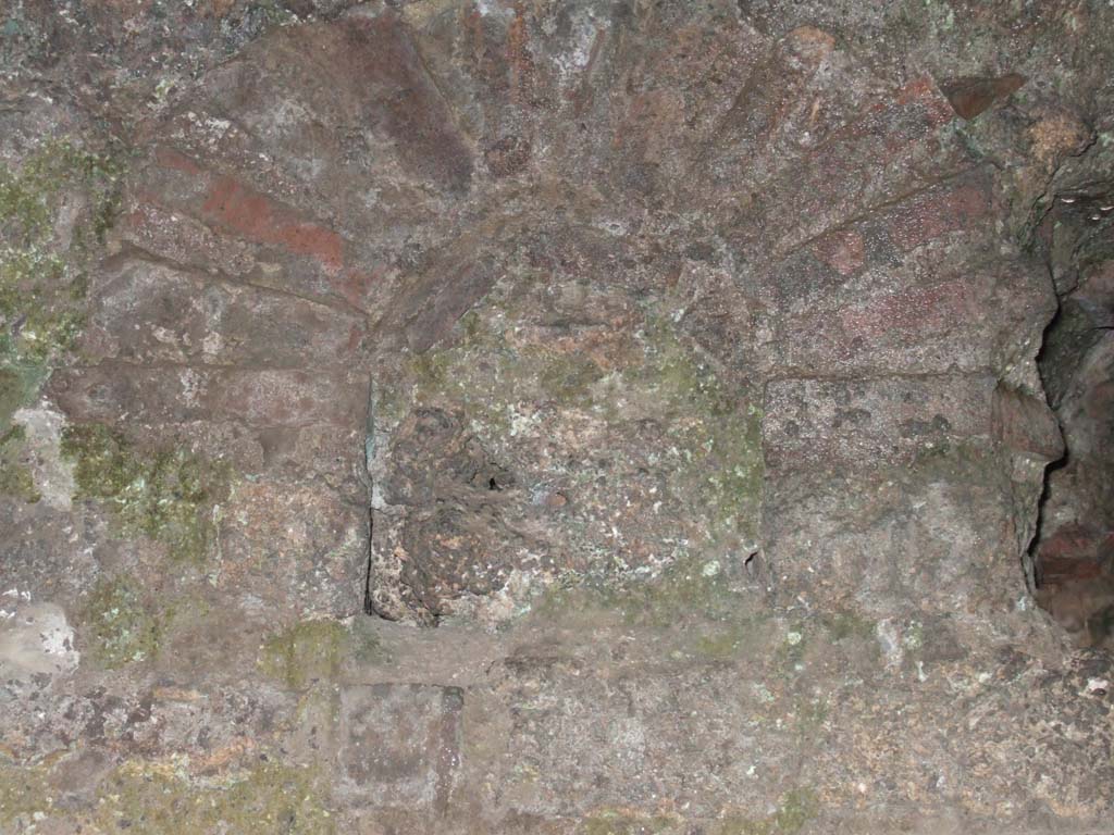 VII.14.9 Pompeii. December 2005. Room 10, filled-in niche on south wall. The same niche as in north wall of room 9, but the other side.