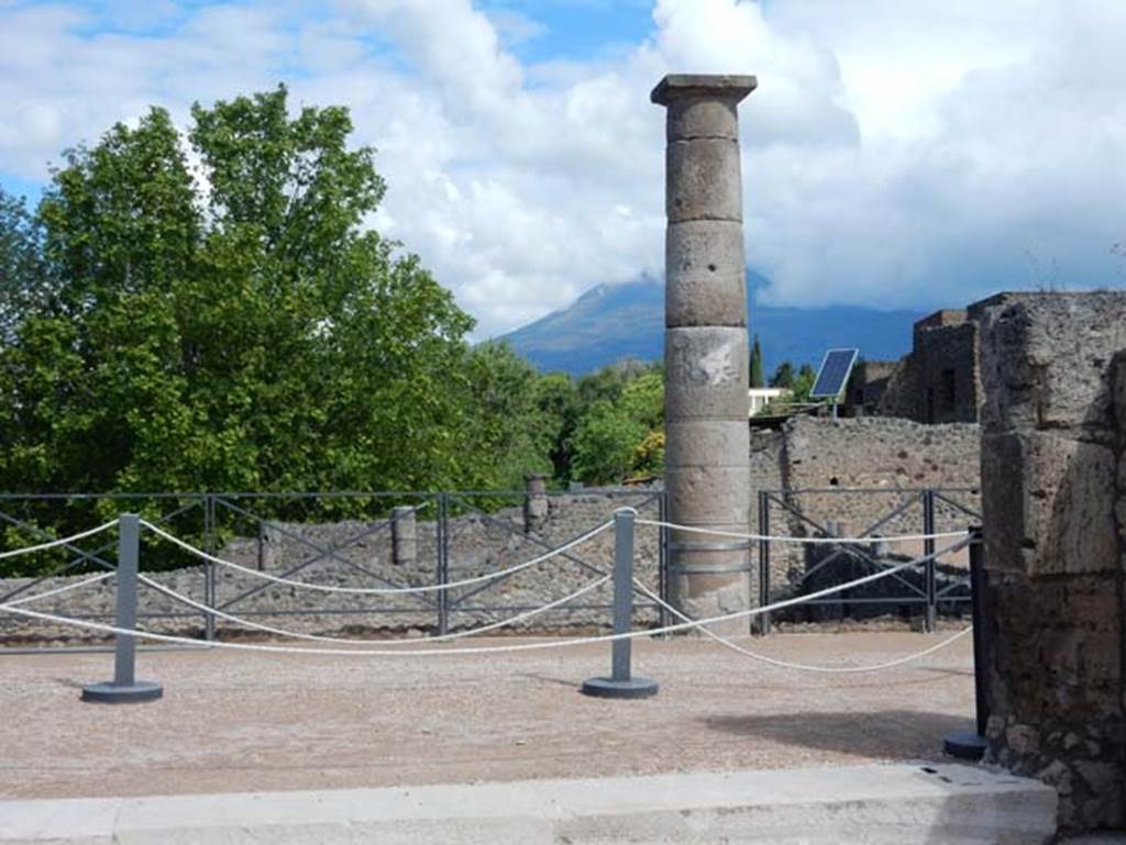 VII.15.2 Pompeii. May 2018. Looking north-east from tablinum onto south portico, with Vesuvius hidden in the clouds. Photo courtesy of Buzz Ferebee. 
