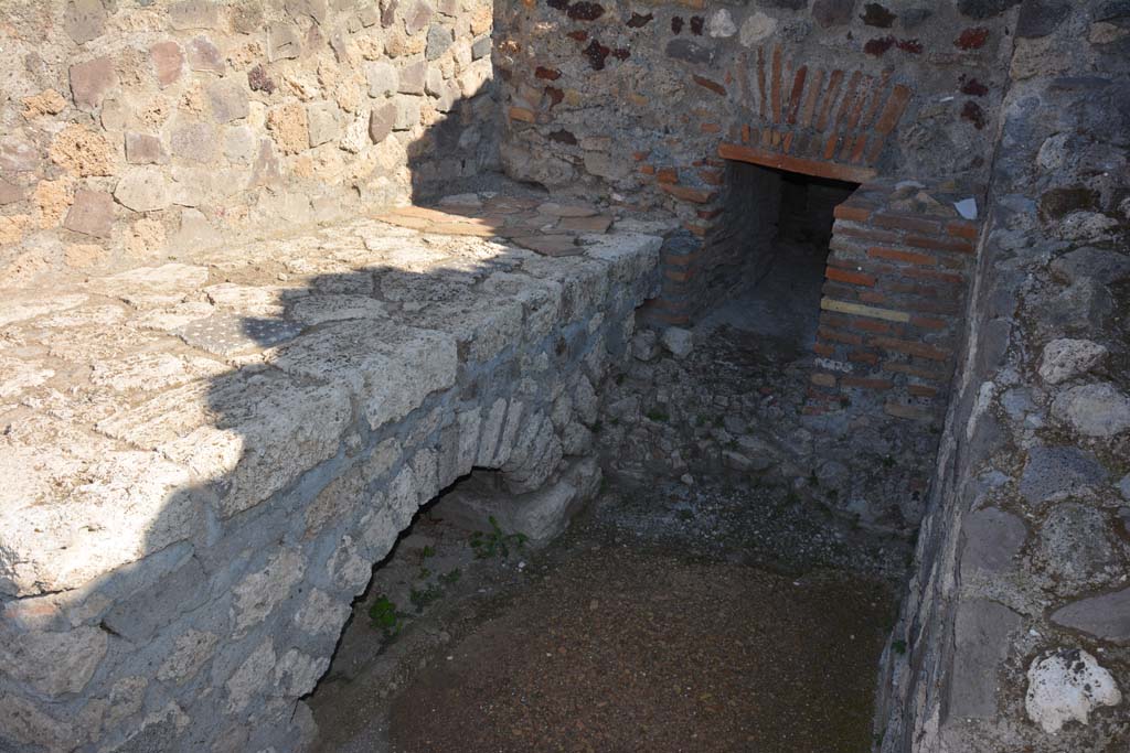 VII.15.2 Pompeii. October 2019. Hearth against north wall in kitchen, looking east.
Foto Annette Haug, ERC Grant 681269 DÉCOR.
