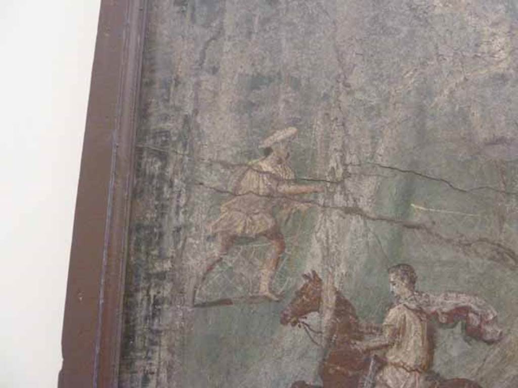 VII.15.2 Pompeii. May 2010. Detail from Slaughter of the Niobids from north wall of apodyterium. The Niobids try to escape the deadly arrows which is futile. The servants, in short tunics and wearing hats, continue the hunt as if unaware of what is happening around them. Now in Naples Archaeological Museum.  Inventory number 111479. See Bragantini, I and Sampaolo, V., Eds, 2009. La Pittura Pompeiana. Verona: Electa.  (p. 270, Fig 115)