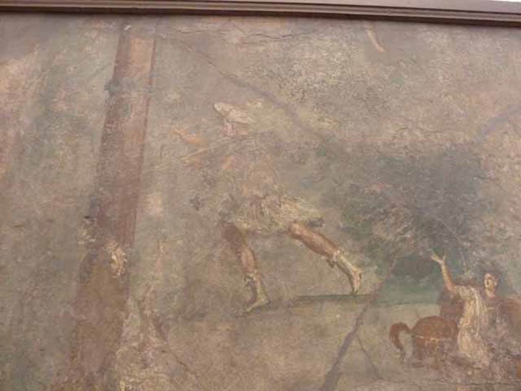 VII.15.2 Pompeii. May 2010. Detail from Slaughter of the Niobids from north wall of apodyterium. The leg at the top of the picture is that of Apollo. The servants, in short tunics and wearing hats, continue the hunt as if unaware of what is happening around them.
Now in Naples Archaeological Museum.  Inventory number 111479. See Sogliano, A., 1879. Le pitture murali campane scoverte negli anni 1867-79. Napoli: Giannini. (p. 85, Item 505).