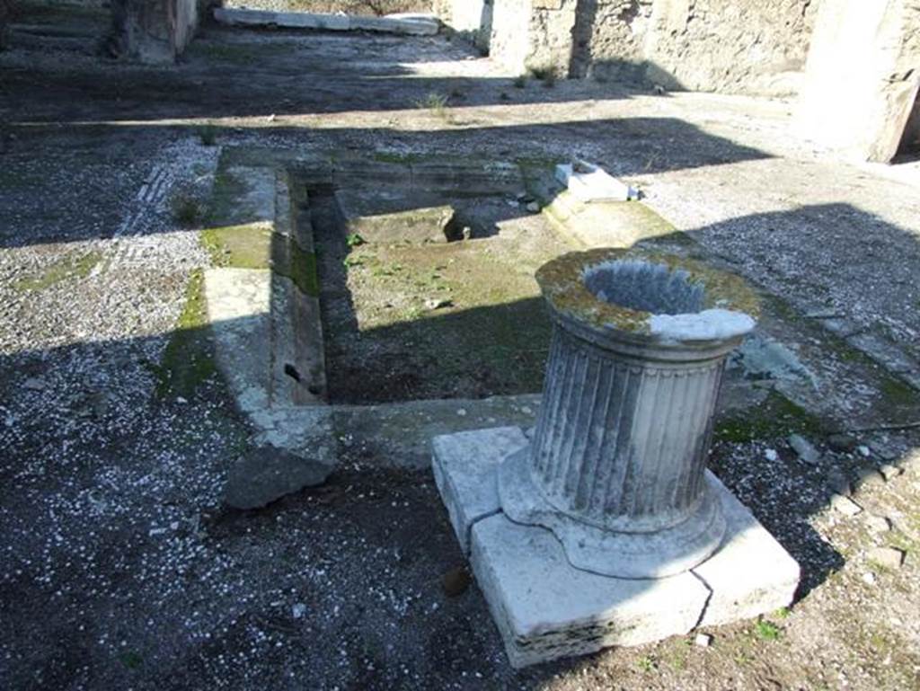 VII.15.2 Pompeii. September 2005. Impluvium and cistern head.