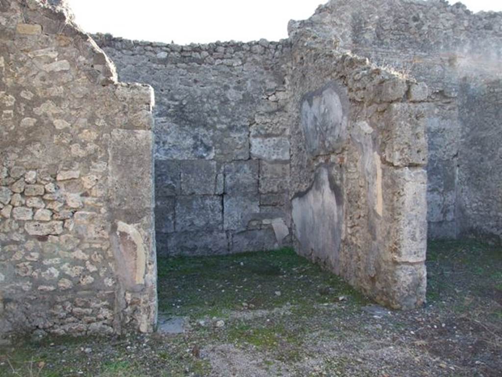 VII.15.13 Pompeii. December 2007. Doorway to room in south-east corner of atrium.