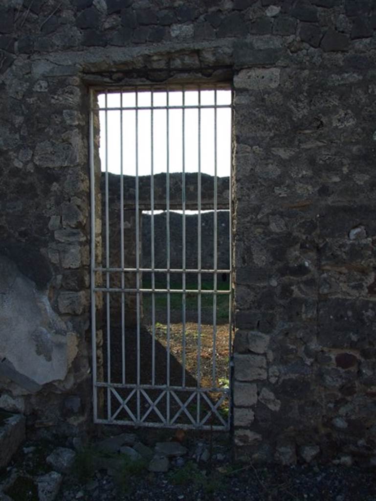 VII.15.13 Pompeii. December 2007. Door to VII.15.14 from Atrium.
