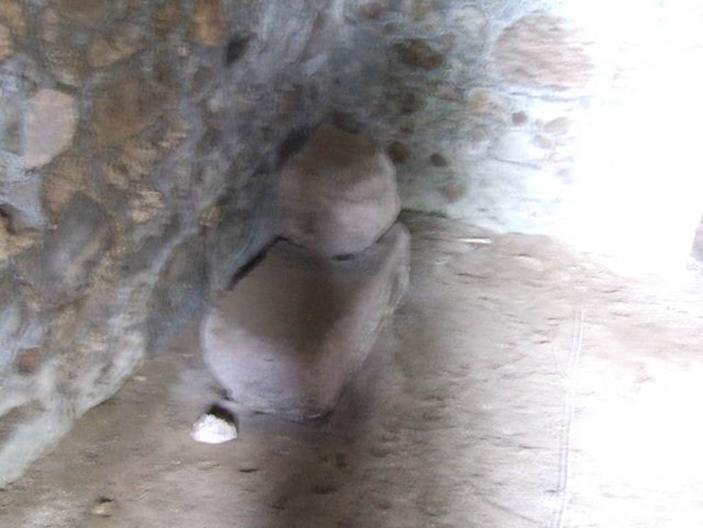 VII.15.16 Pompeii. May 2006. Granary.  Room f, north-east corner, and wall to left of doorway to corridor A.