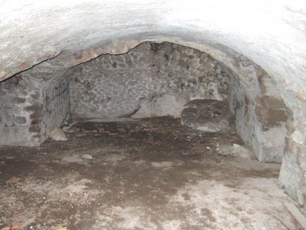 VII.15.16 Pompeii. May 2006. Open space I, looking east from open space H.
In the south-east corner of (I), centre right, is a circular masonry base.