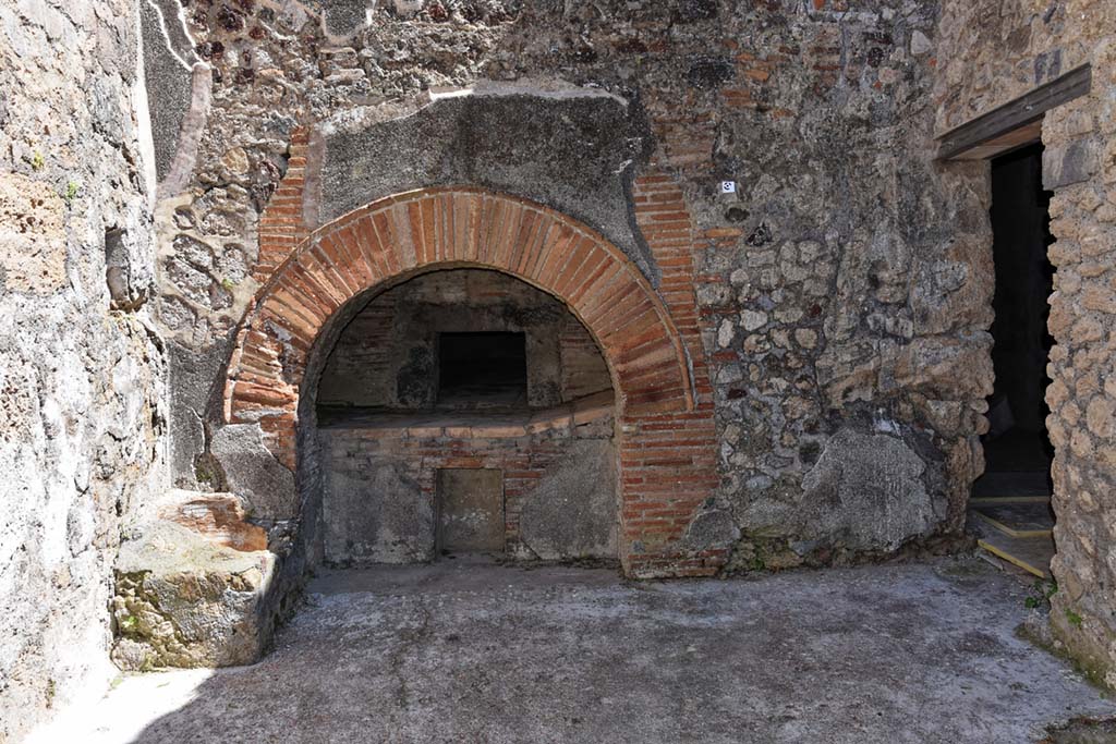 VII.15.16 Pompeii. April 2019. Looking east to granary oven located under the baths area of VII.15.2.
The doorway to room O is on the right. Photo courtesy of Nicolas Monteix.