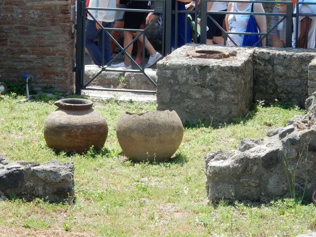VII.16.7 Pompeii. June 2019. Looking south across bar-room from rear room, towards entrance doorway.  
Photo courtesy of Buzz Ferebee.
