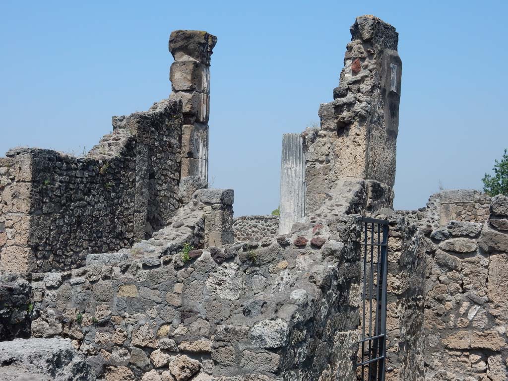 VII.16.12, Pompeii. June 2019. Looking north from gateway on west side of atrium towards VII.16.13, tablinum.
Photo courtesy of Buzz Ferebee.