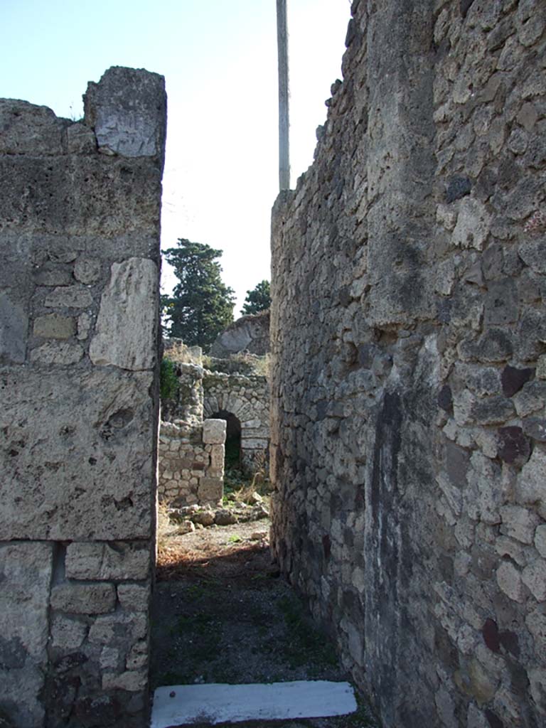 VII.16.13 Pompeii.  December 2007. 
Room 11, corridor on south side of atrium, leading to rooms on southern boundary, and VII.16.12.
