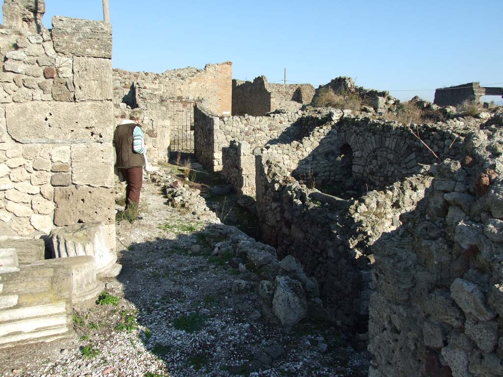 VII.16.13 Pompeii. December 2007. Looking east along corridor 12 towards doorway at entrance VII.16.12. 
Corridor 12 on the ground floor level leads into corridor 40 on the lower level.
