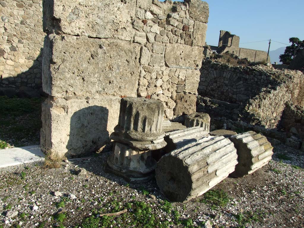 VII.16.13 Pompeii. December 2007. Area 18, south-east corner of peristyle outside room 10. Broken columns from peristyle.